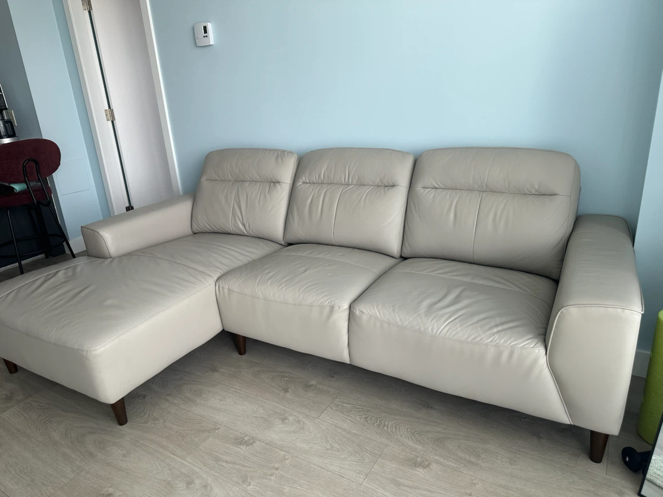 Modern leather match sectional sofa with chaise