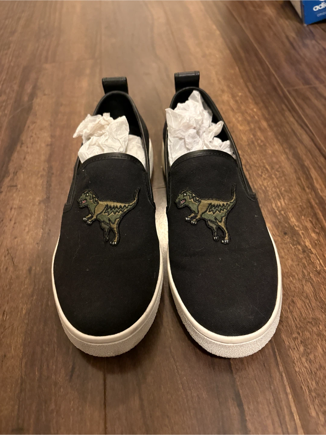 Coach Black Slip-On Sneakers with Dinosaur Appliqué