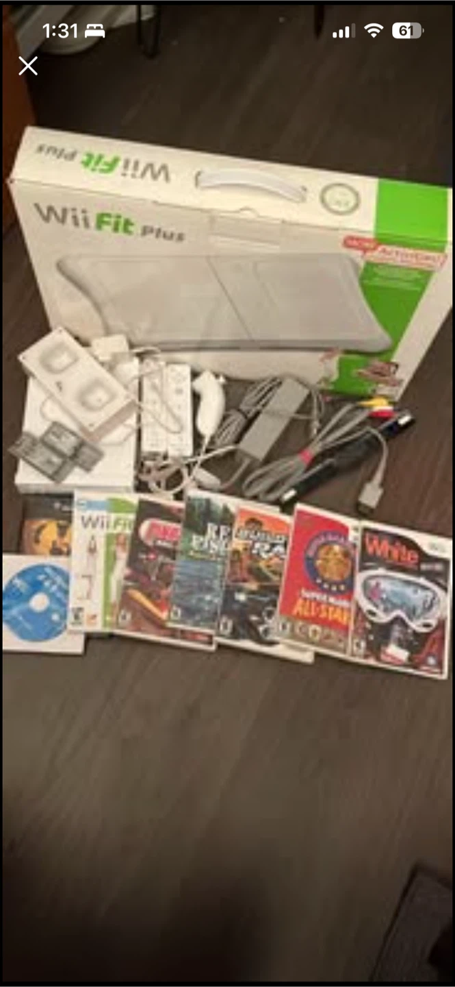 Nintendo Wii Fit Plus Bundle with Games