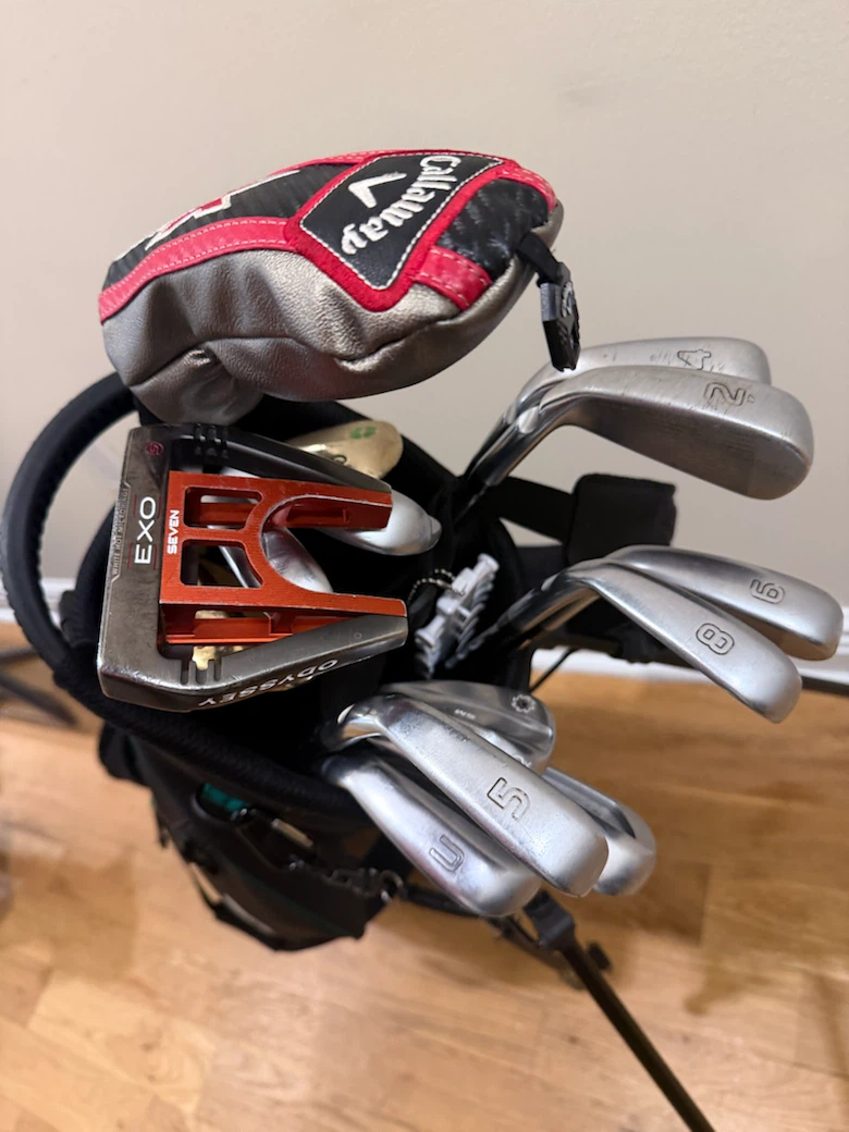 Ping irons & Malbon bag & odyssey putter & Callaway three iron