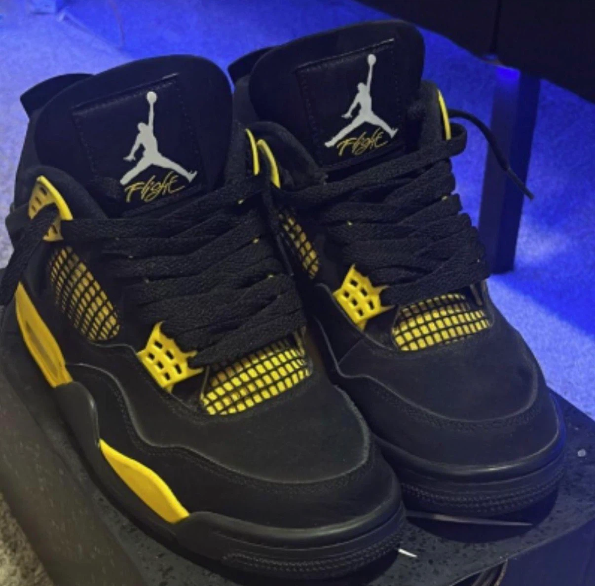 Air Jordan 4 Black Yellow Retro Sneakers