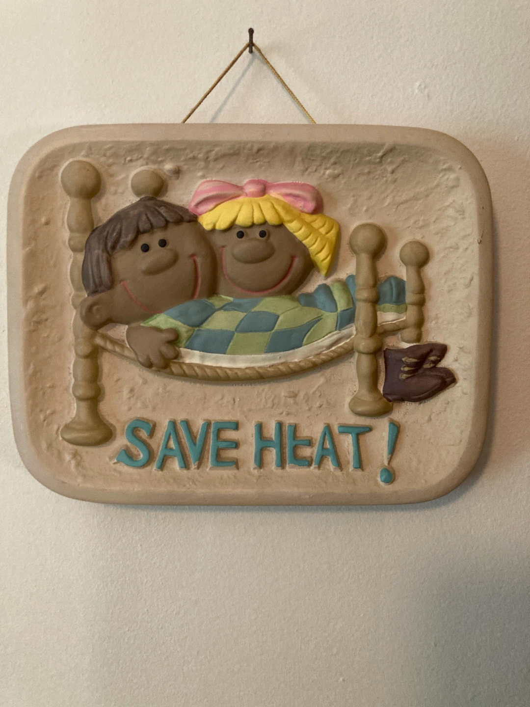 SAVE HEAT! Decorative Wall Plaque