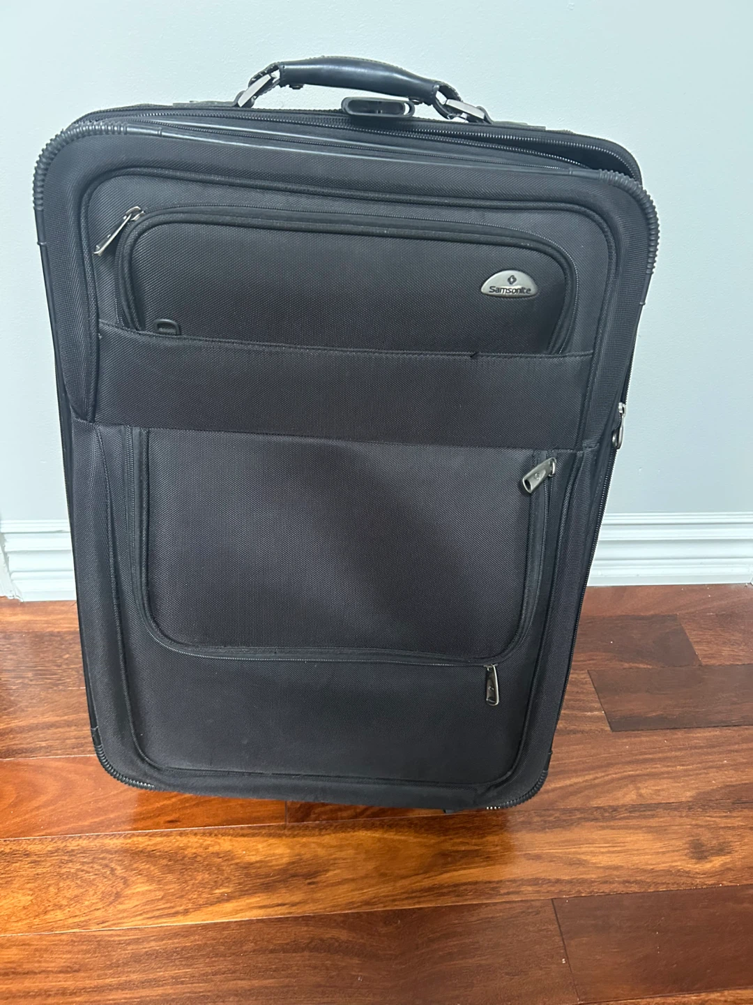 Samsonite Black Rolling Suitcase