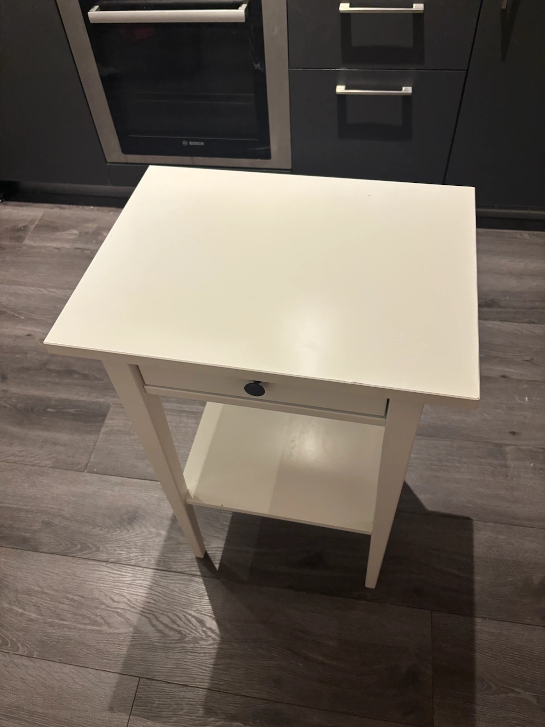 White side table with drawer and shelf