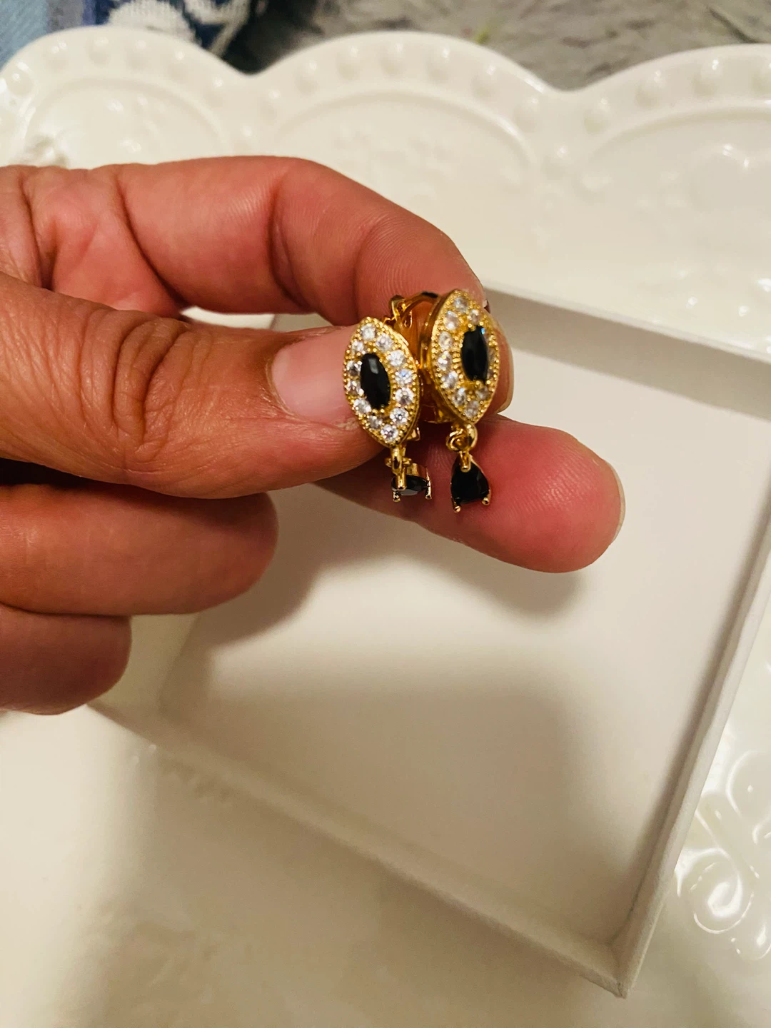 New (unused) Gold tone earrings with black and clear stones