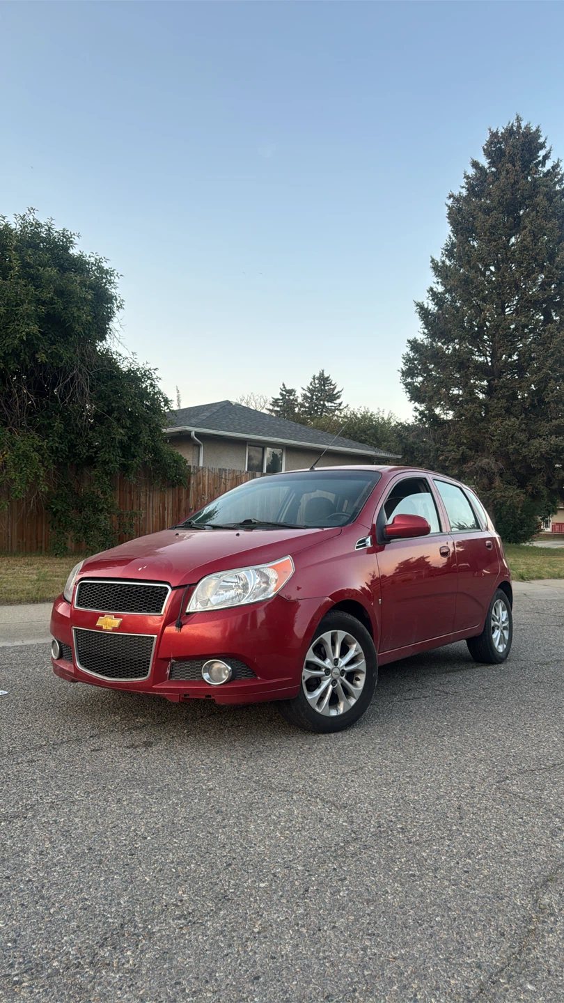 Red Chevrolet Aveo Hatchback