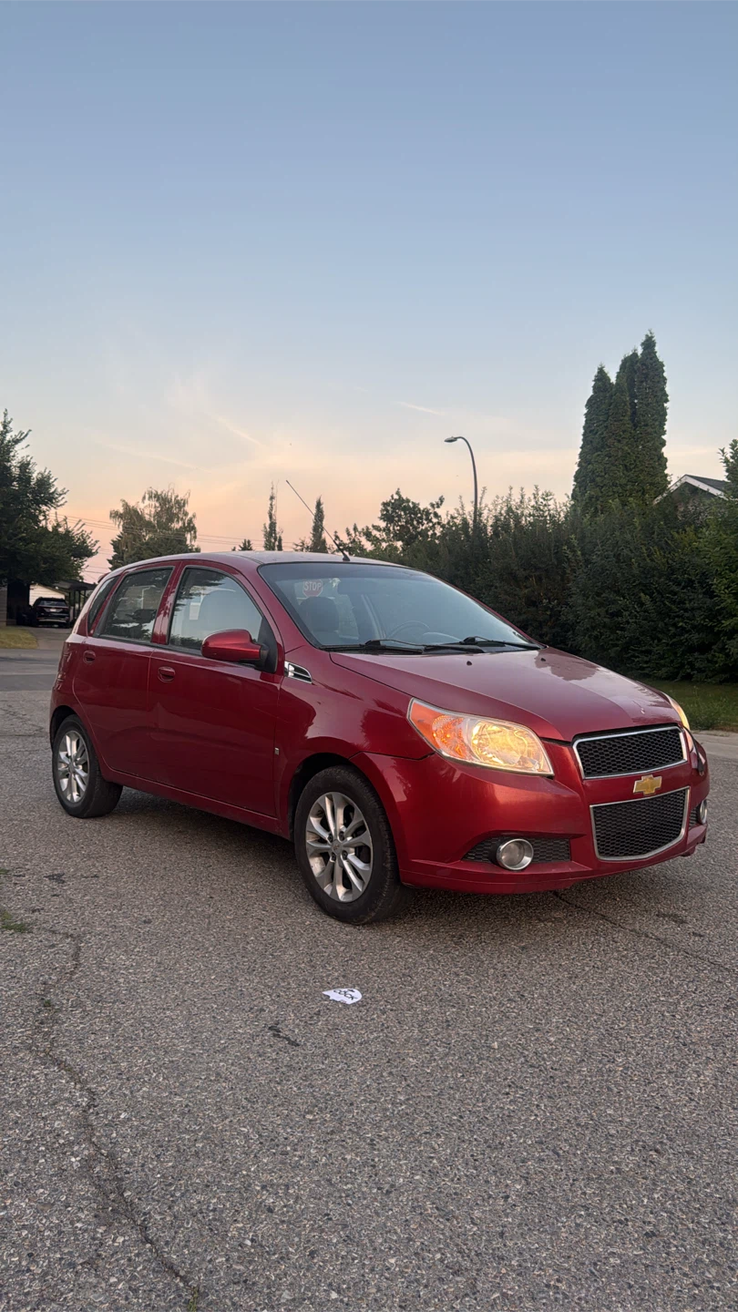Red Chevrolet Aveo Hatchback - photo 3