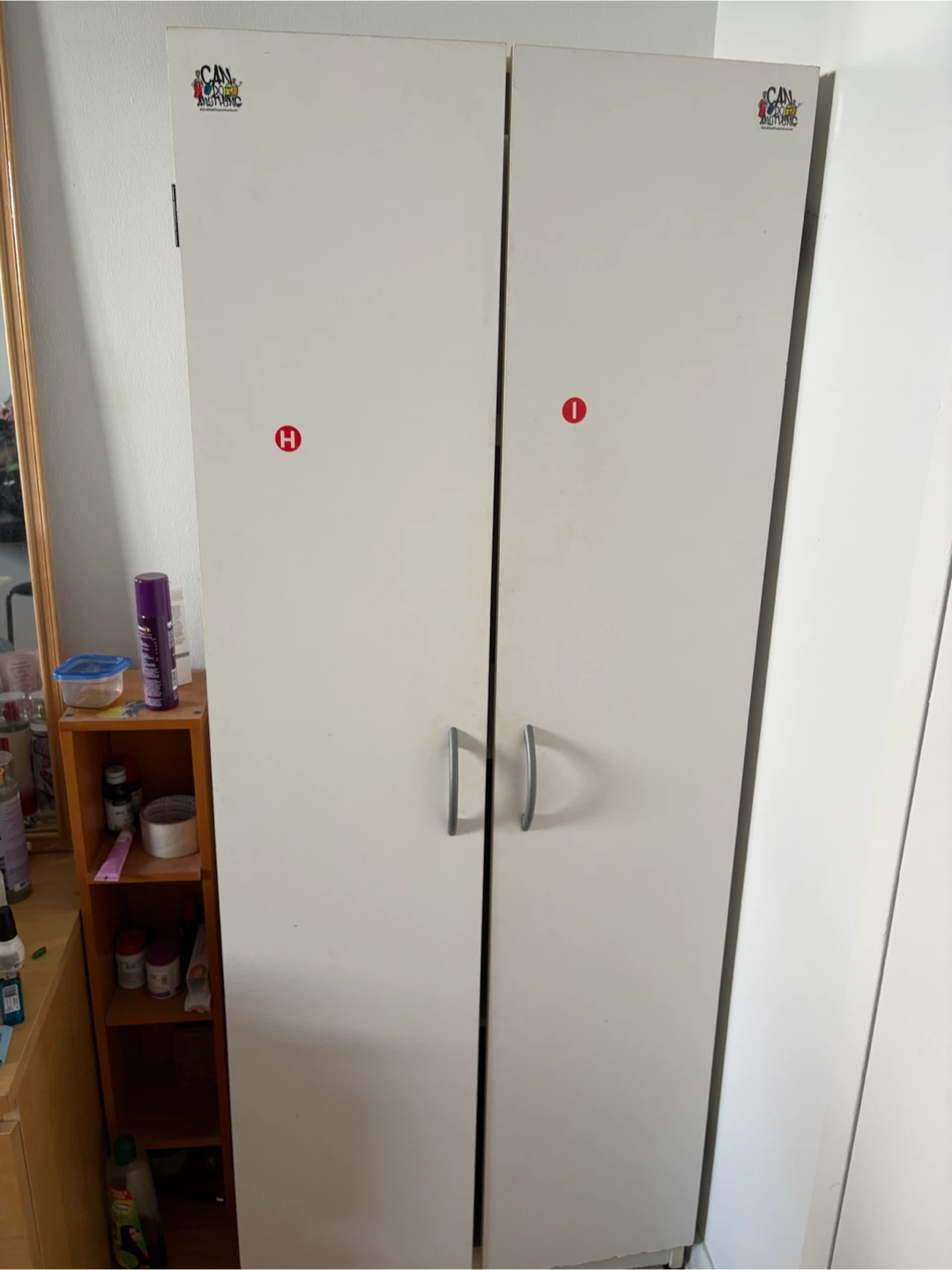 Tall White Two-Door Storage Cabinet