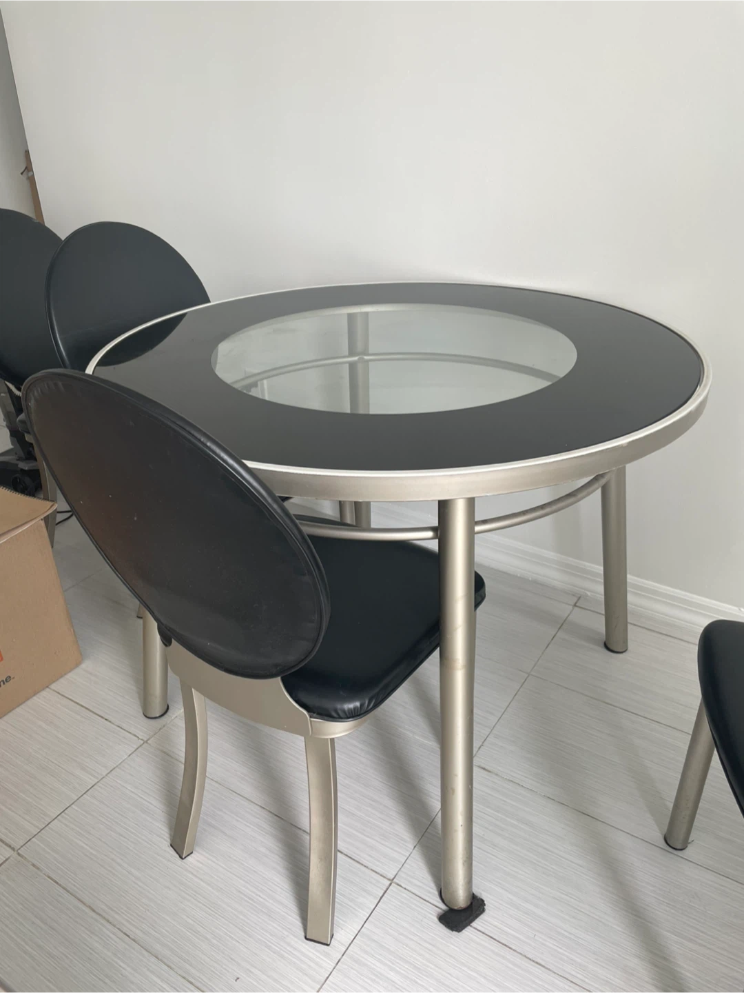 Round Glass Top Dining Table Set with 4 Black Chairs