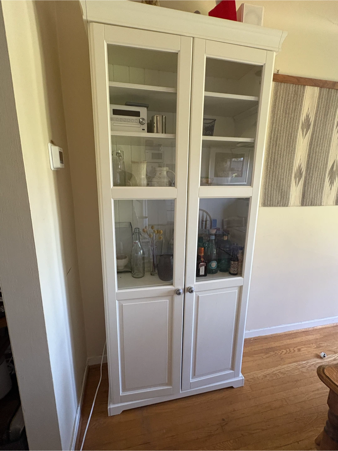 IKEA White display cabinet with glass doors