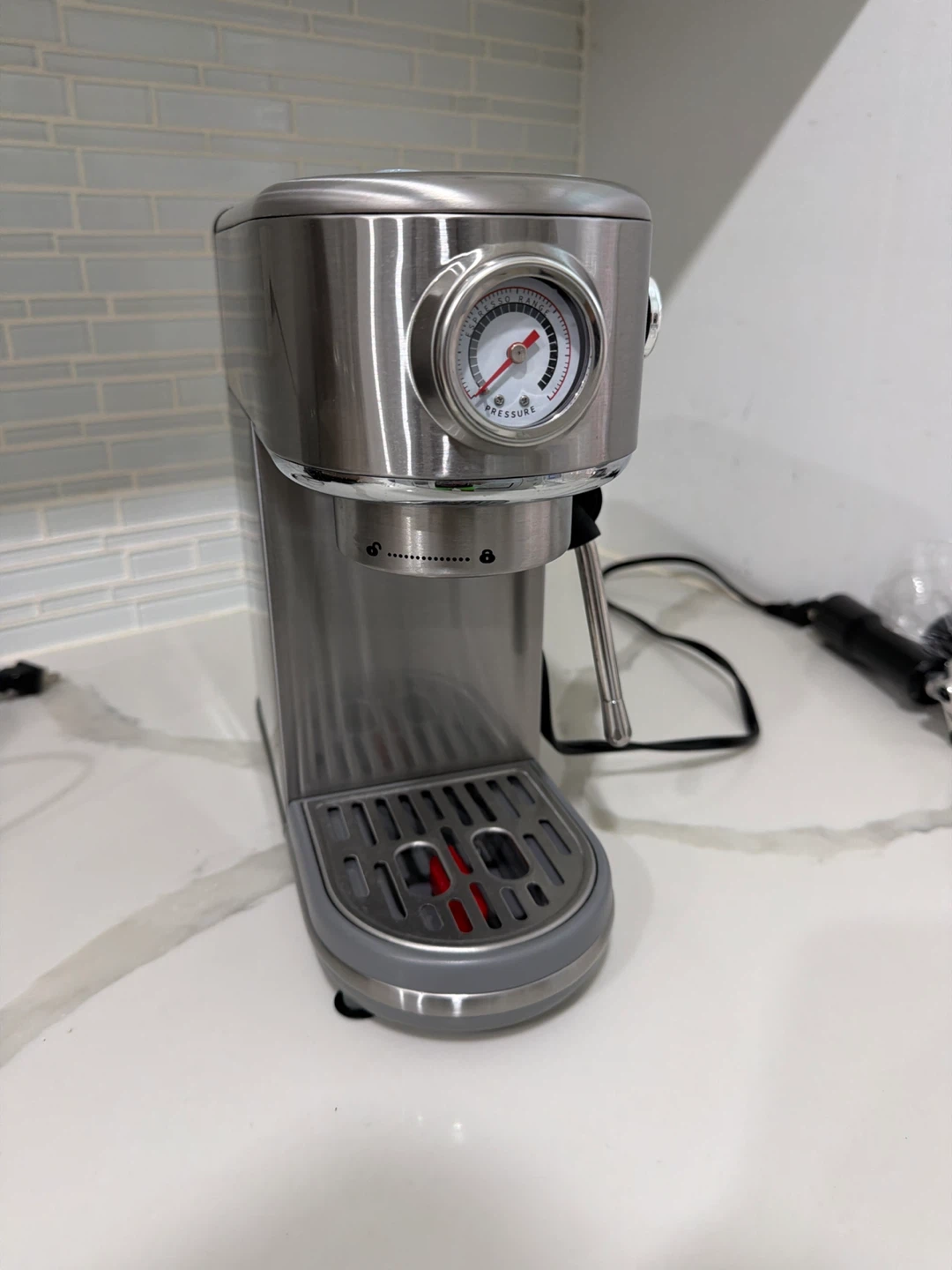 Espresso maker and grinder