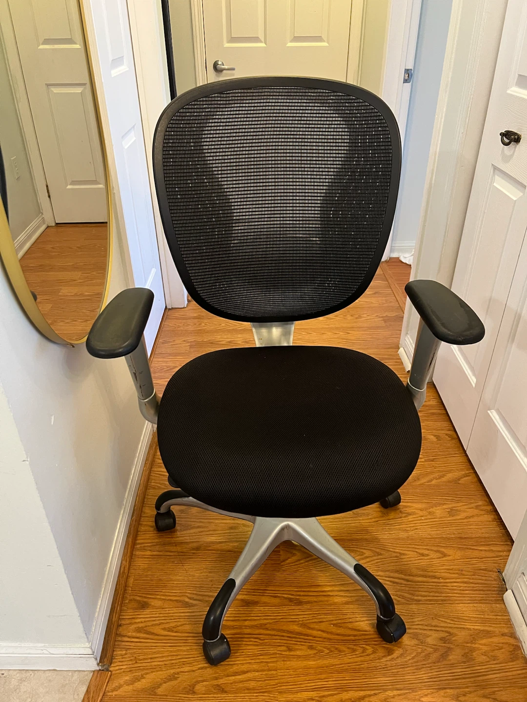 Black Ergonomic Mesh Office Chair with Adjustable Arms