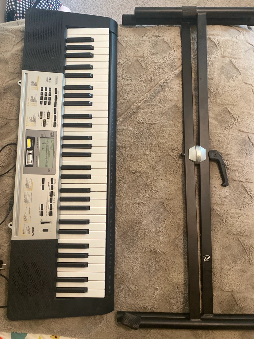 Electric keyboard with stand.