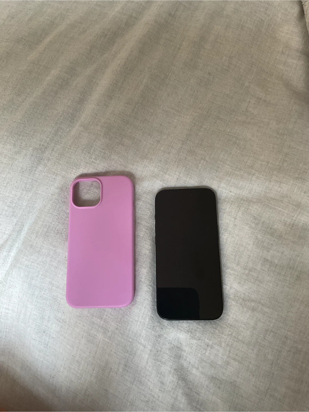 iPhone 15 with a free pink case