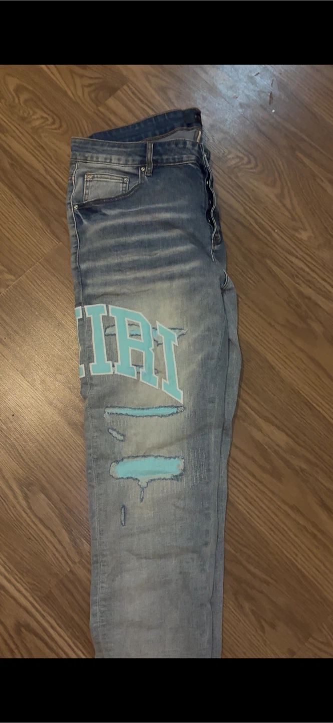 Amiri Distressed Jeans with Logo