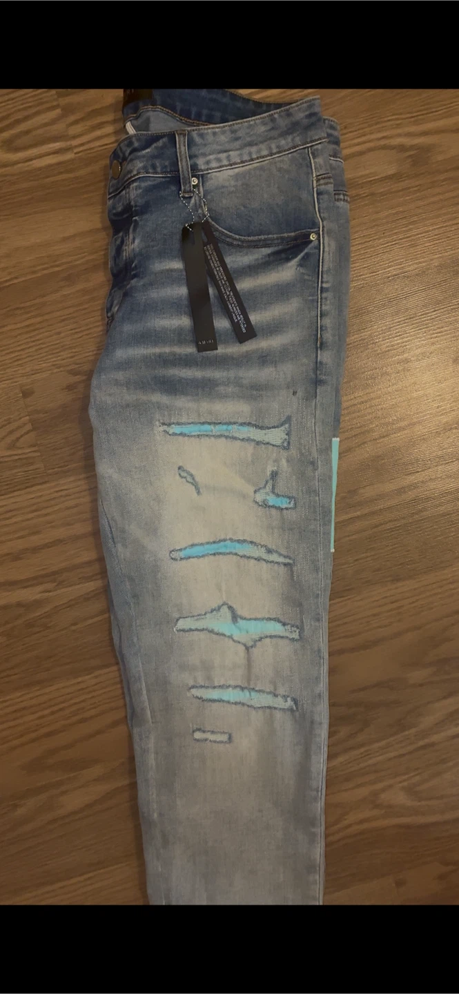 Amiri Distressed Jeans with Logo - photo 4