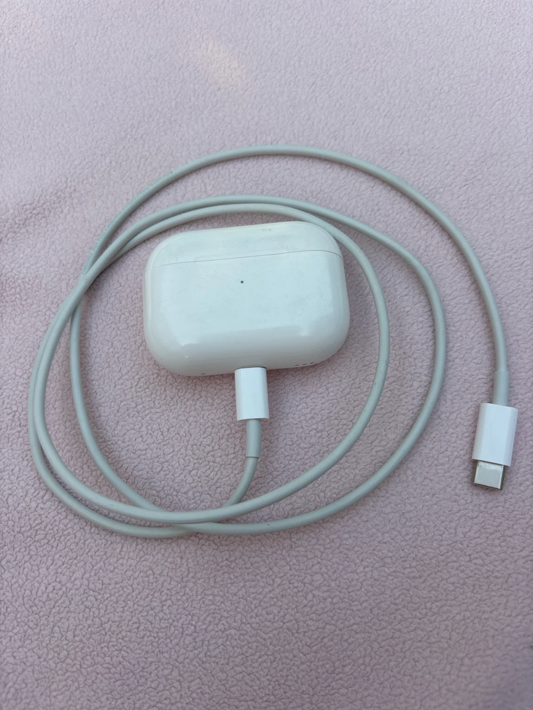 Apple AirPods Pro 2 with charging cable