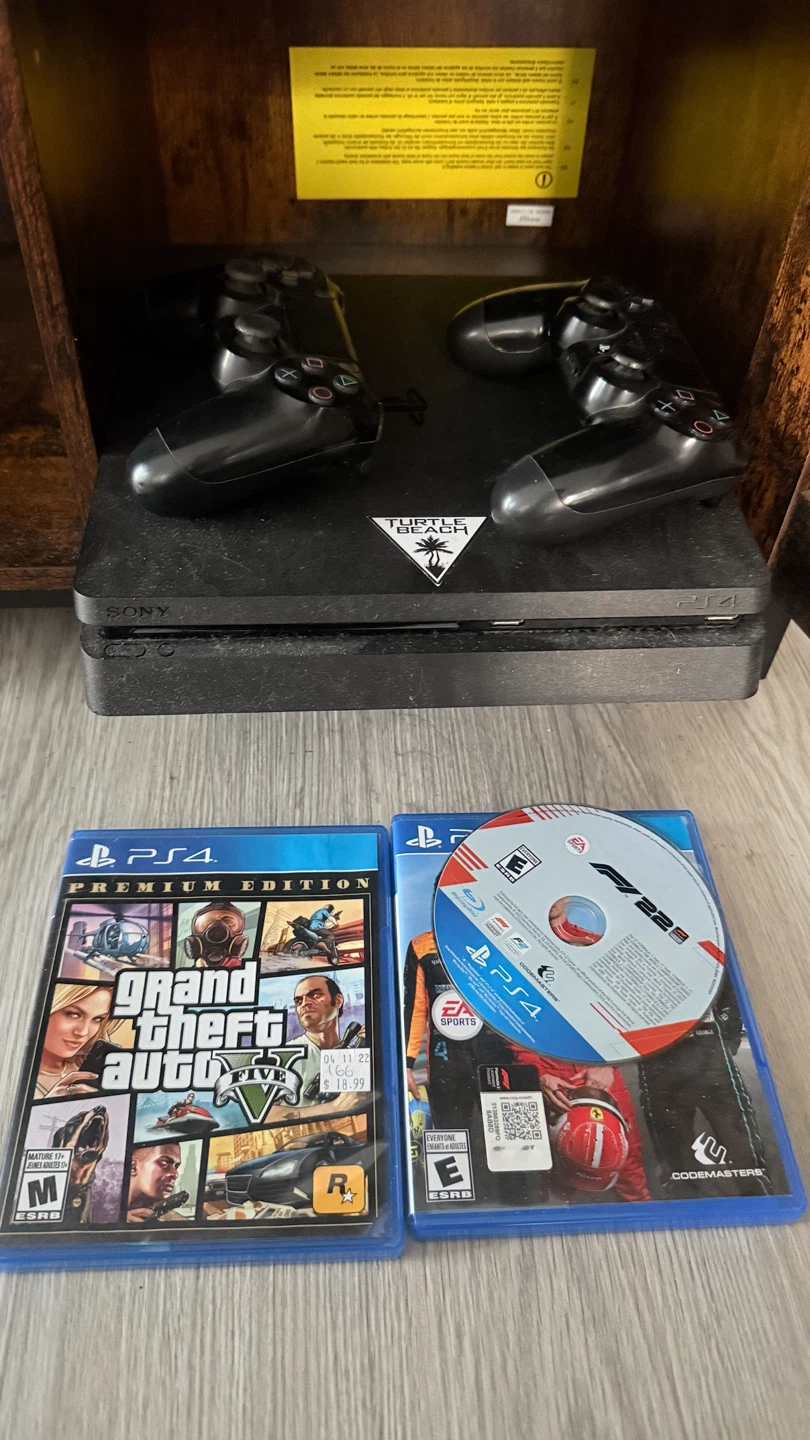 PlayStation 4 Console with 2 Games and 2 Controllers