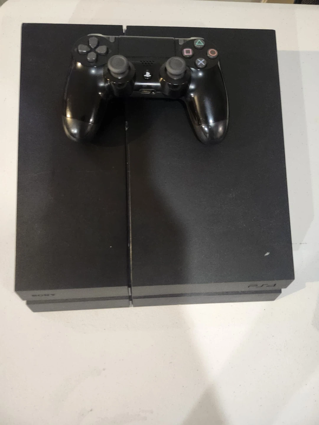 Negotiable playstation 4 with controller - photo 2