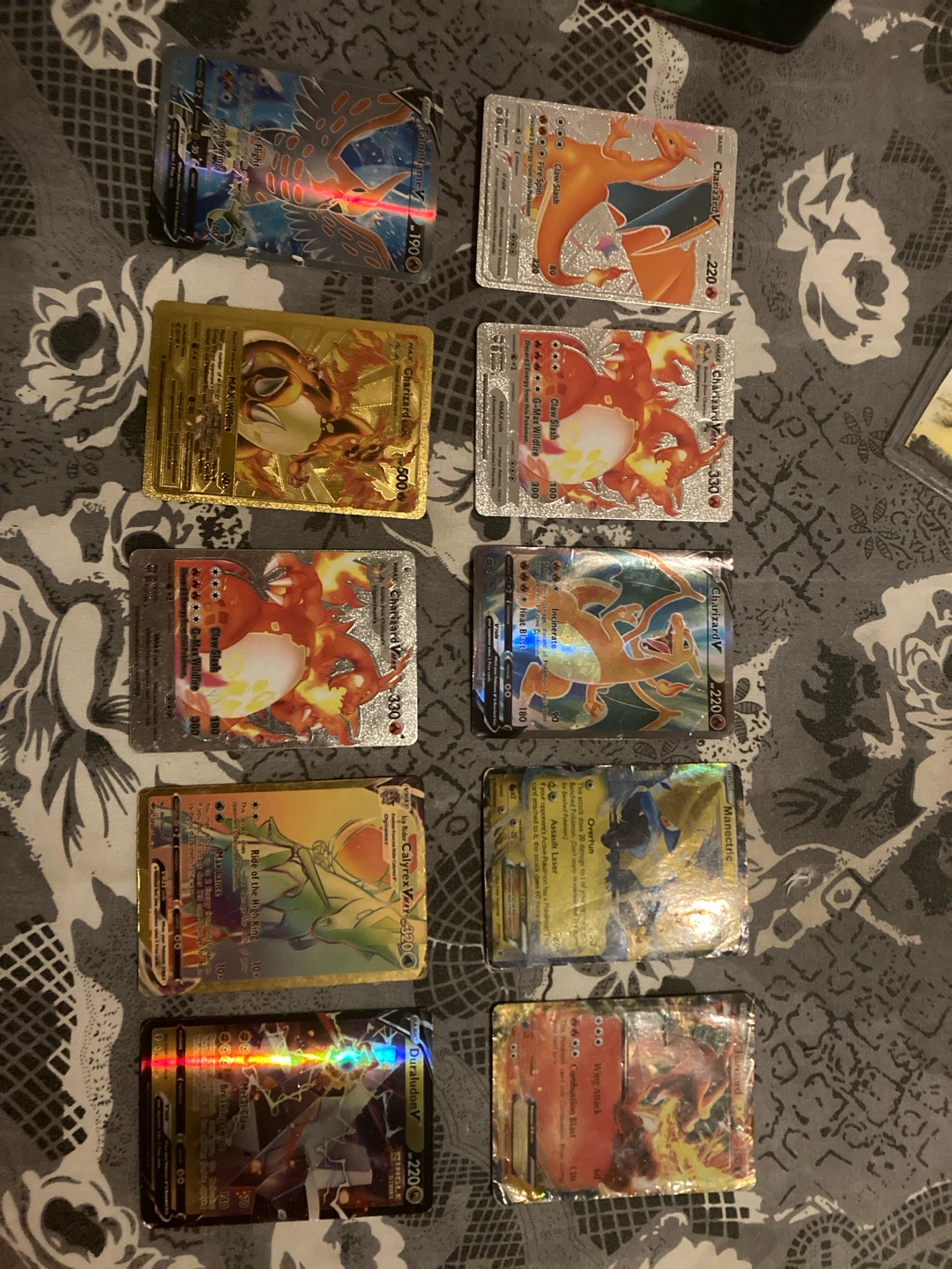 10 rare Pokémon card with a rainbow rare card and golden cards