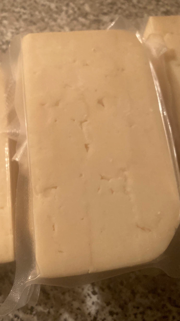 Vacuum-sealed cheese blocks - photo 2