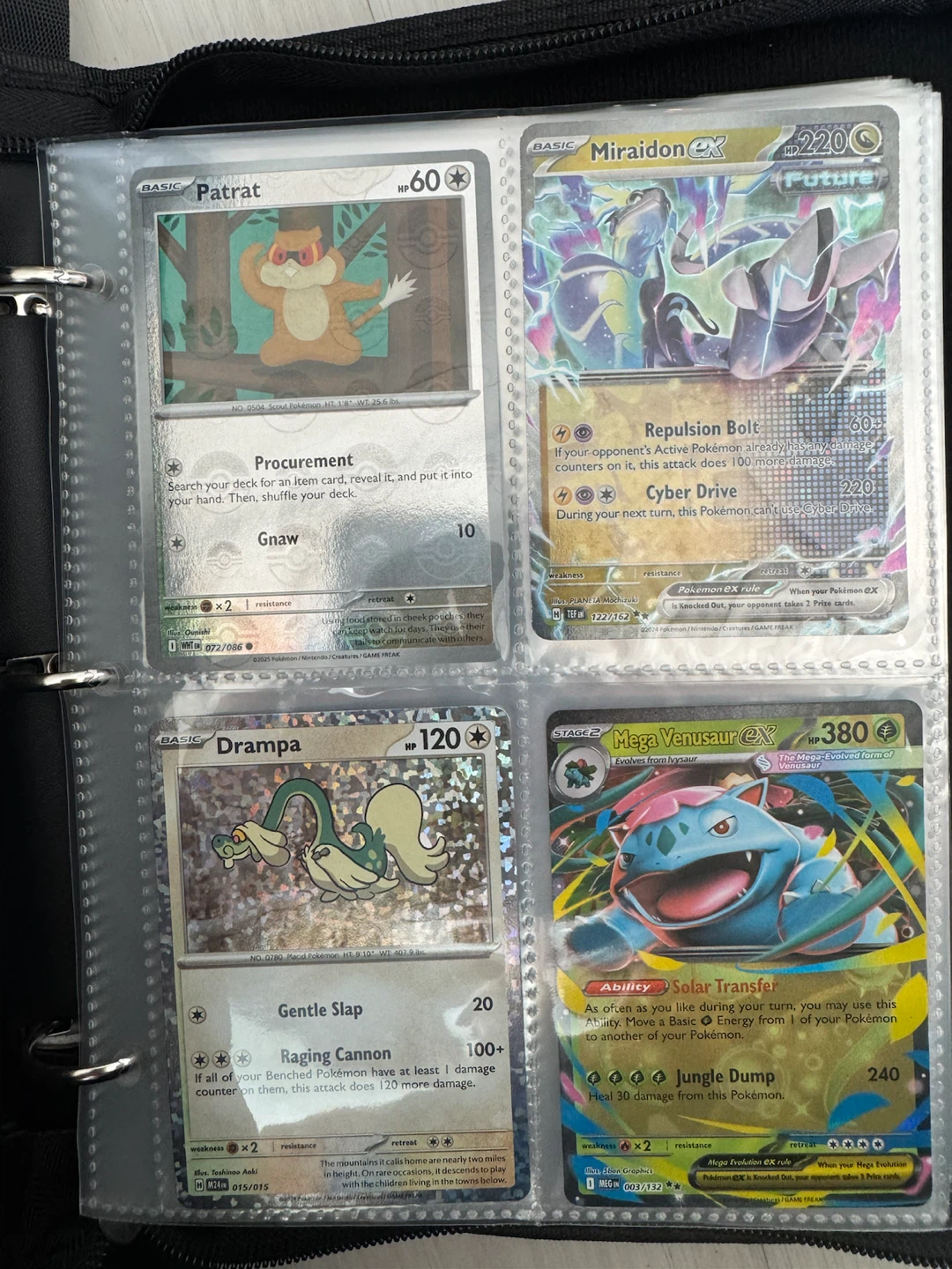 Filled Pokémon card binder