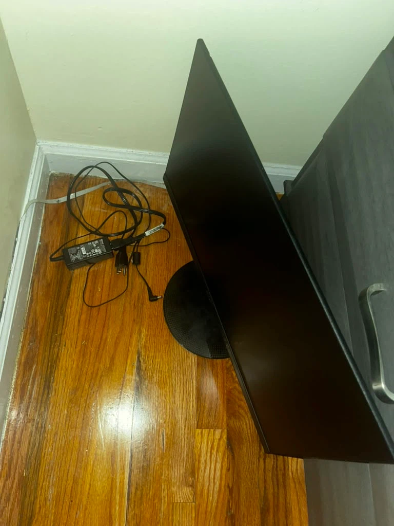 Black Computer Monitor with Power Adapter