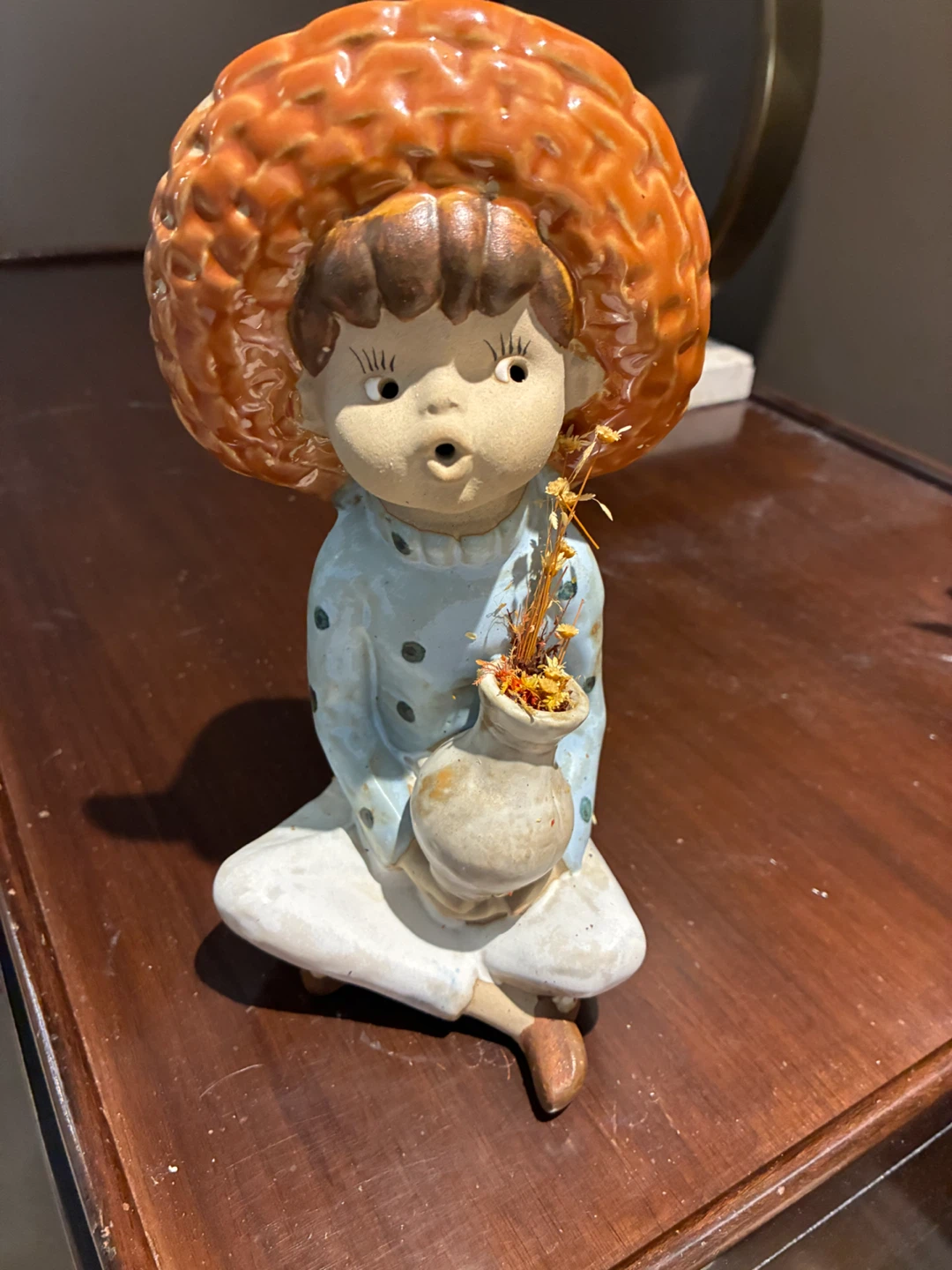 Ceramic Girl Figurine with Orange Hat