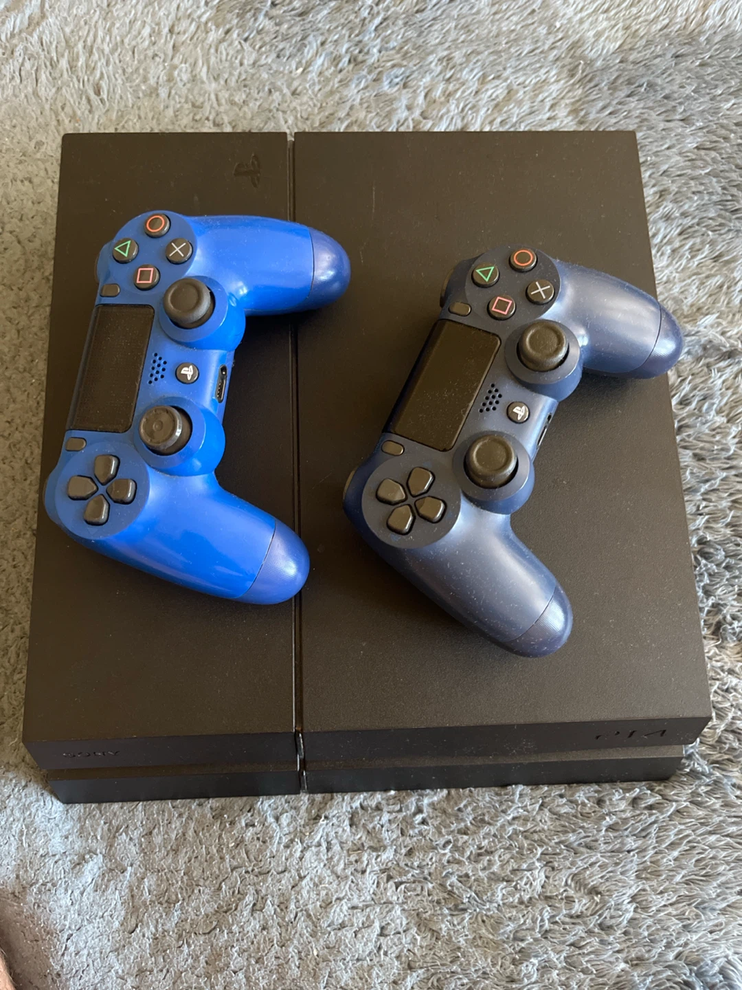 Sony PlayStation 4 Console with 2 Controllers