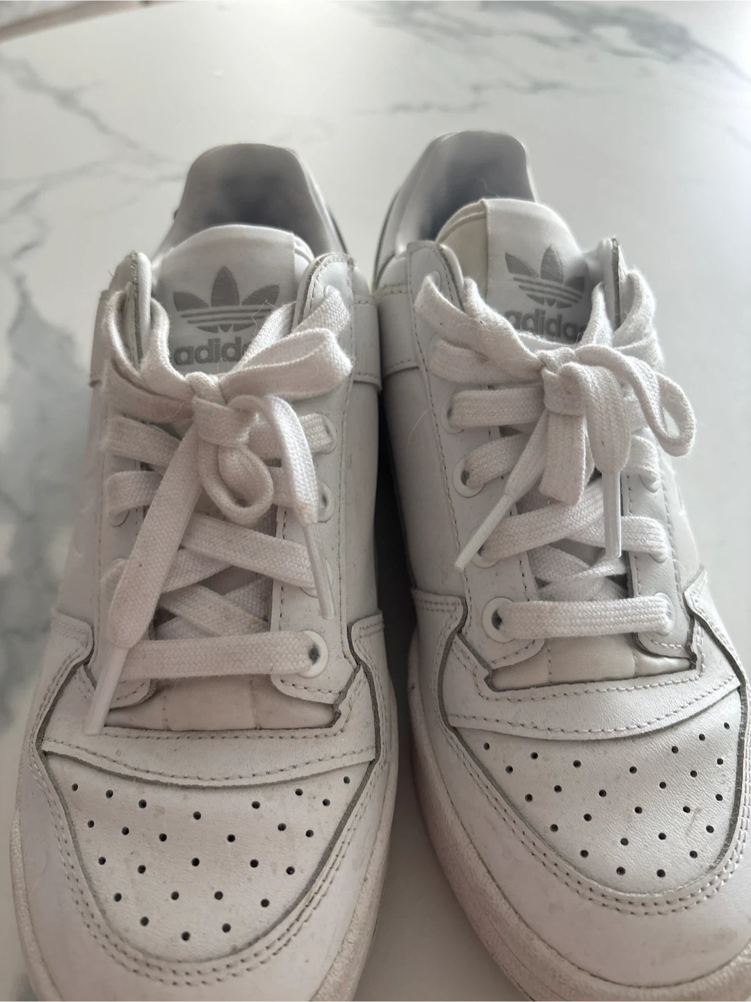 Adidas white low-top sneakers