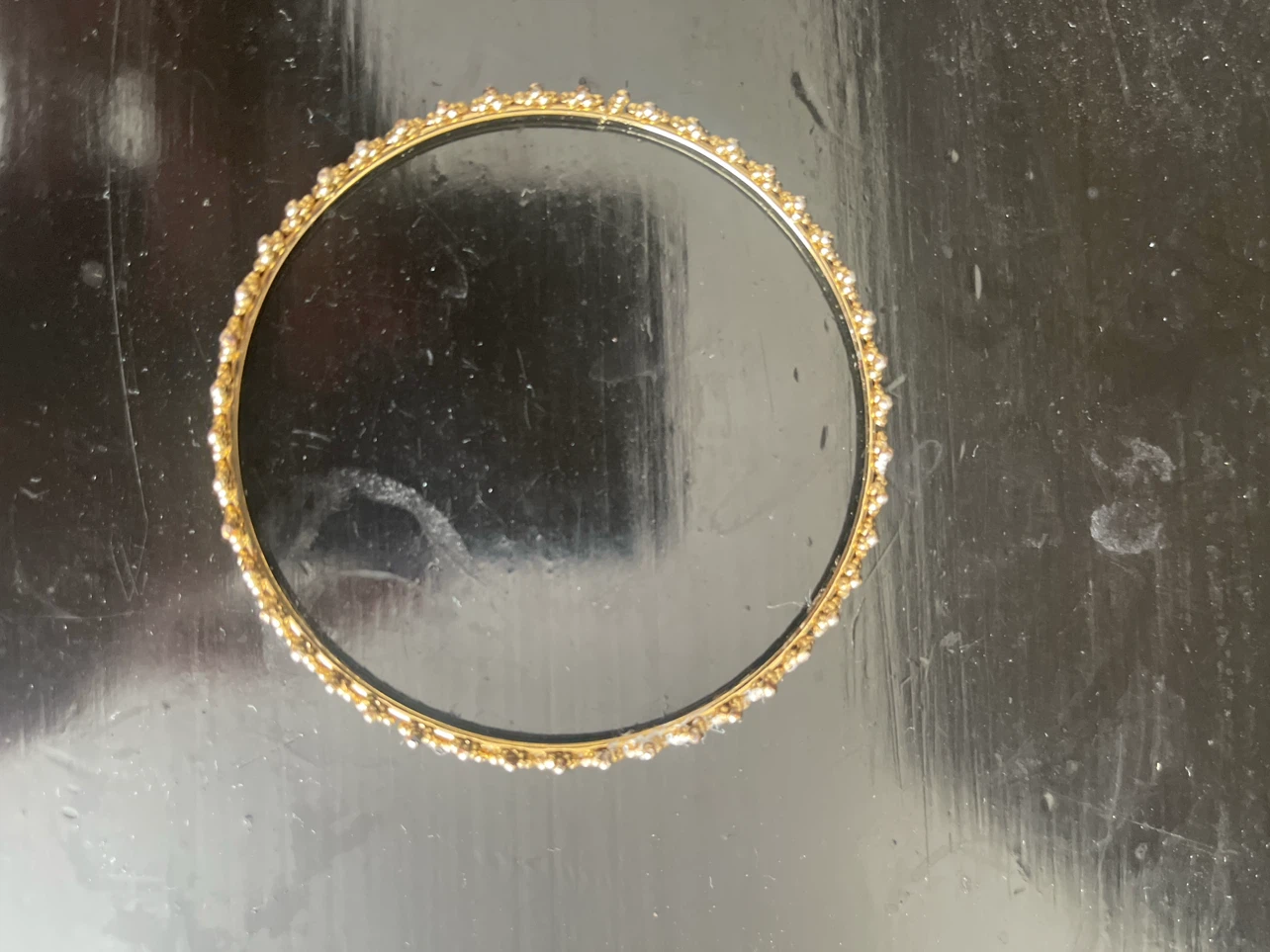 Gold tone bangle bracelet