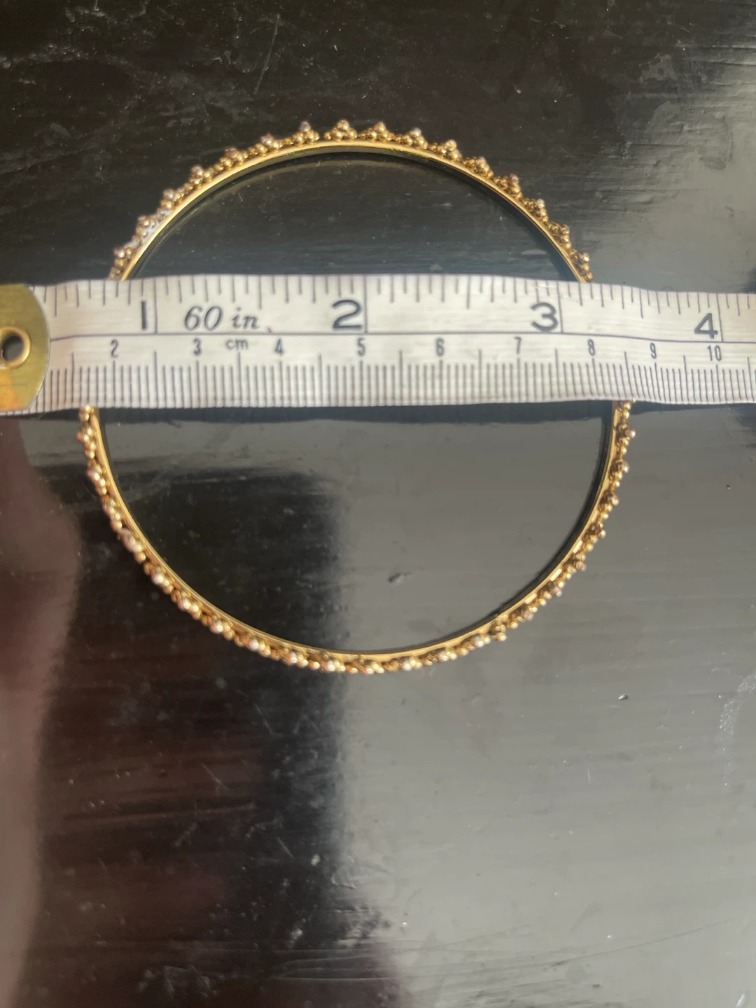 Gold tone bangle bracelet - photo 4