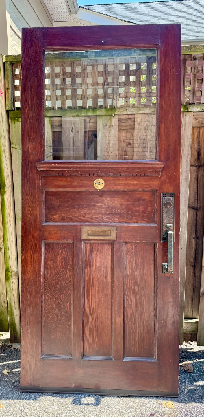 Solid wood exterior door with hardware