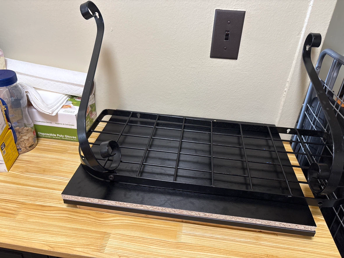 Black Metal Scroll Shelf