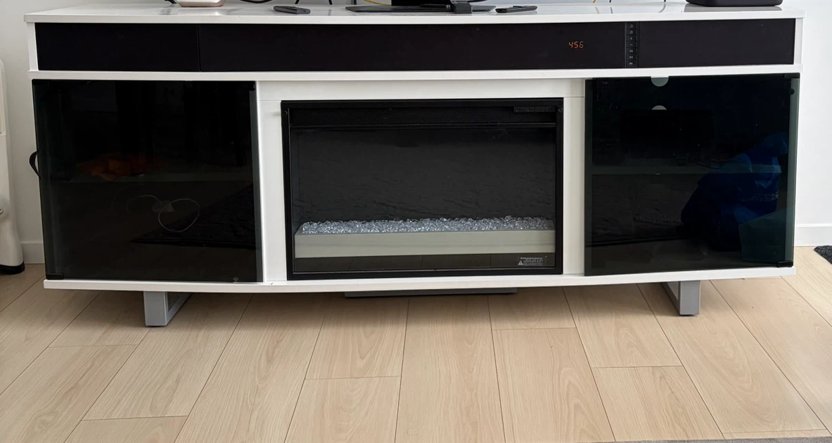 White TV Stand with Electric Fireplace and Black Glass Doors