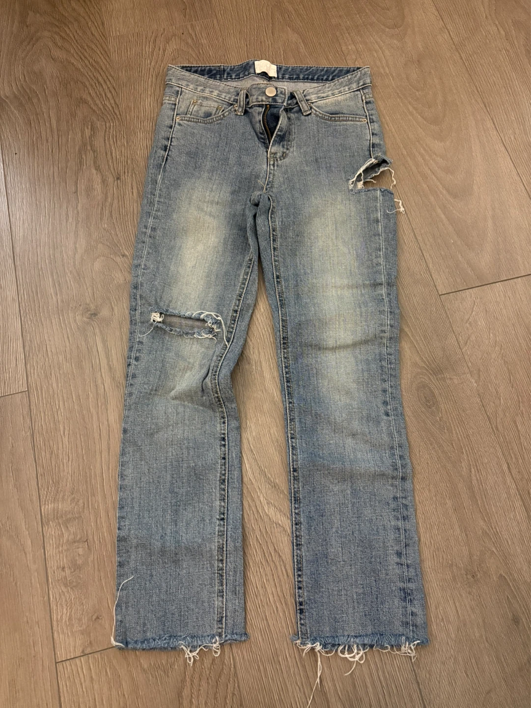 Light Wash Denim Jeans with Rips