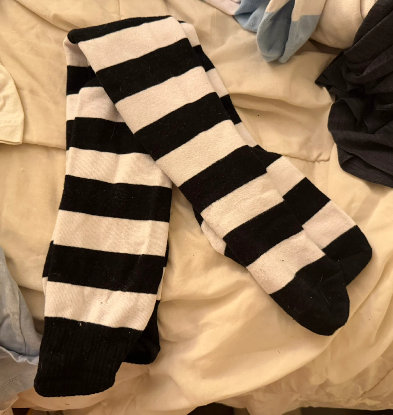 Black and white striped thigh highs