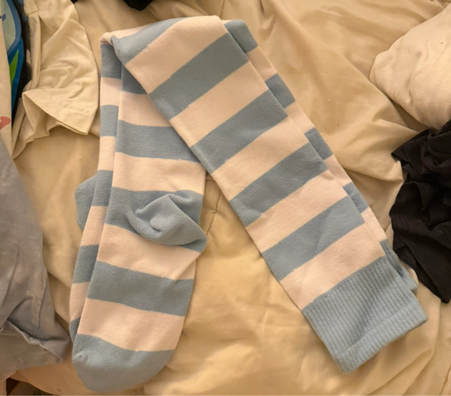 Blue and white striped thigh highs