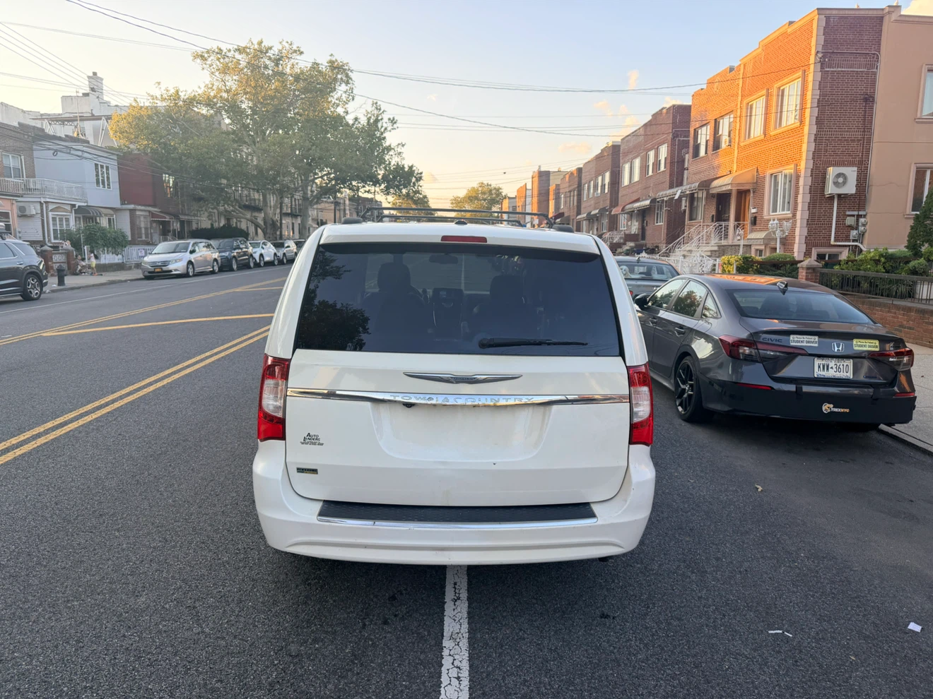 White Chrysler Town & Country Minivan - photo 3