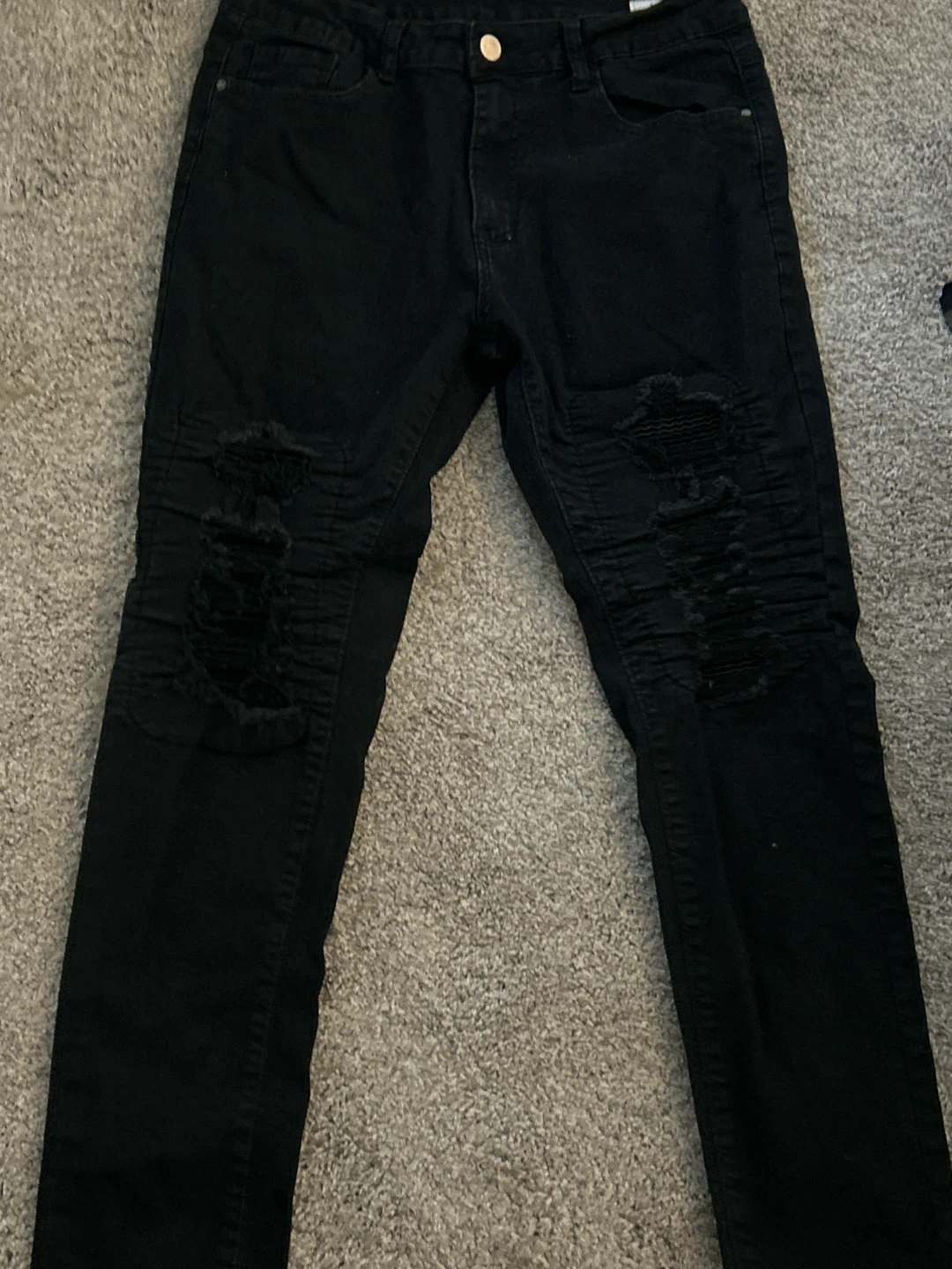 Black ripped moto jeans