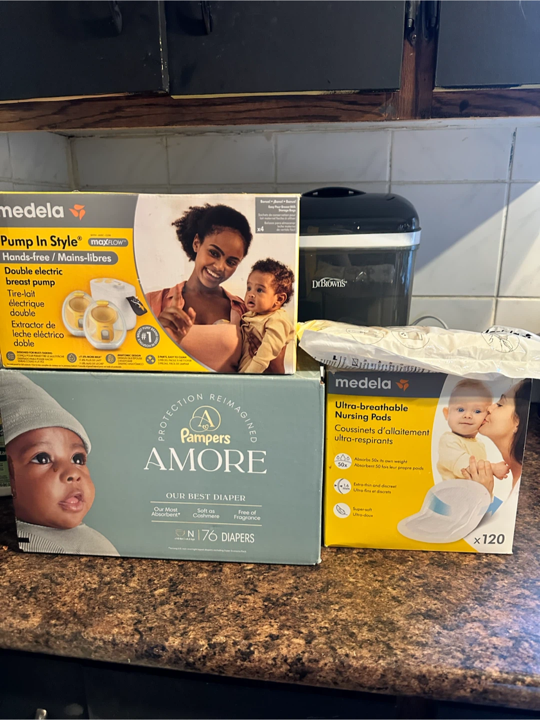 electric pump, pads, milk bags and diapers.