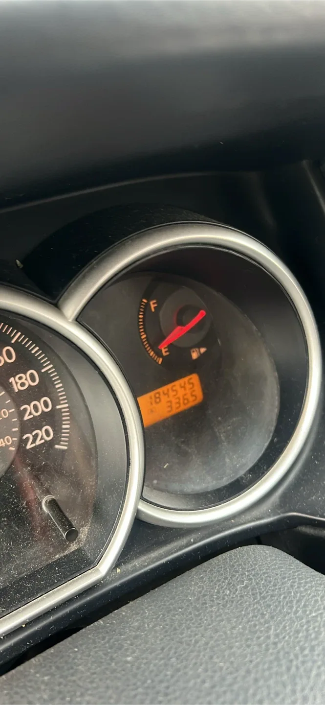 Red Nissan Versa Hatchback - photo 4