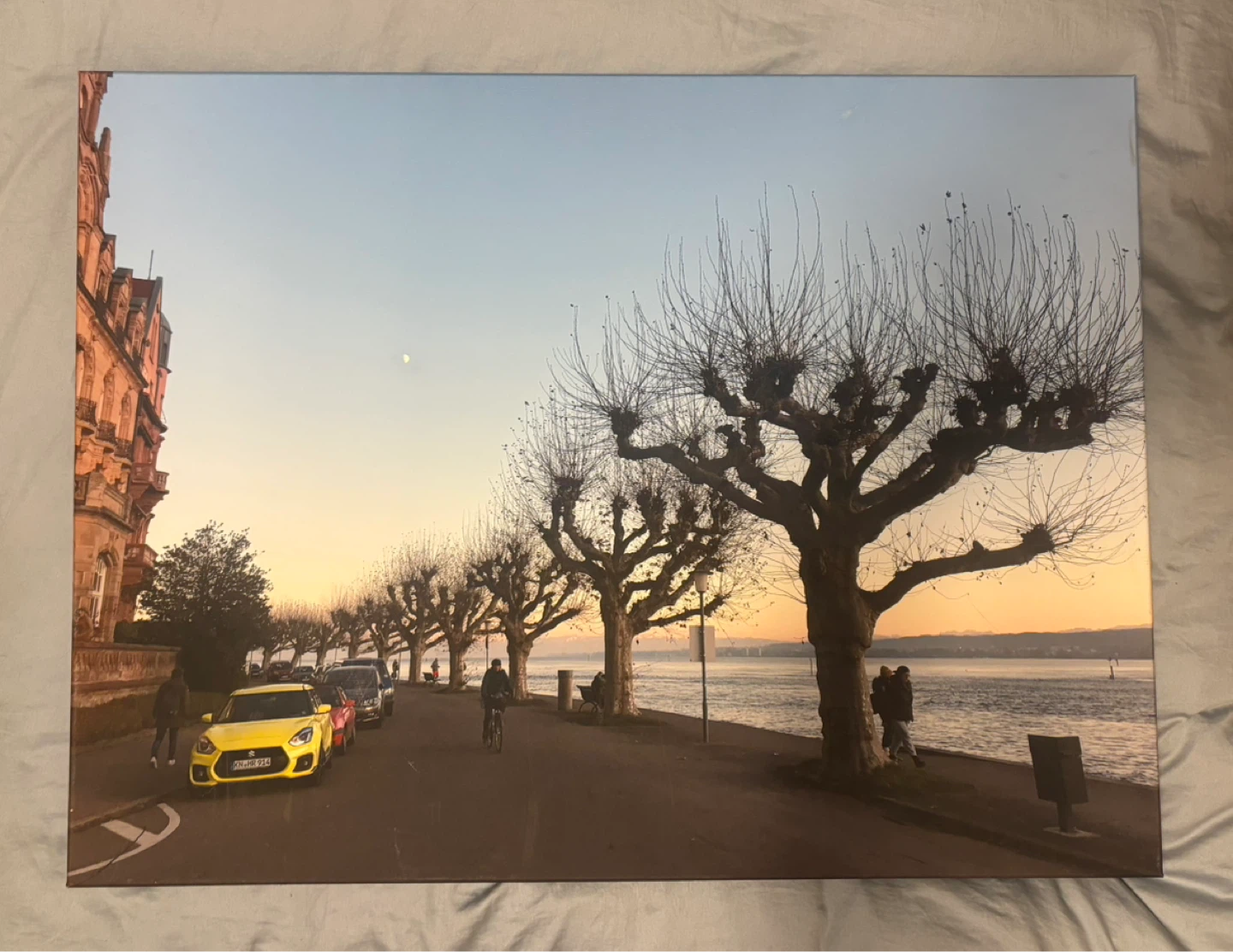 Canvas Print: Sunset Zug, Switzerland  with Yellow Car at Sunset