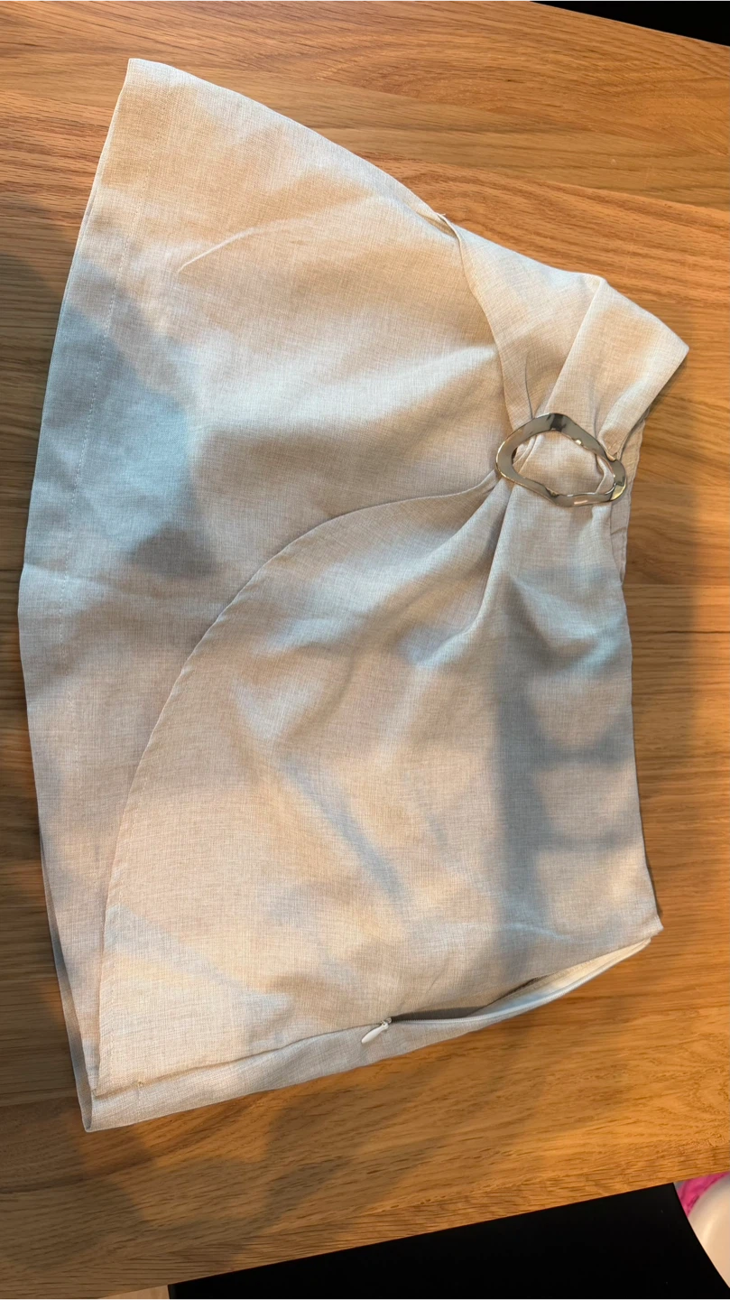 Beige A-Line Mini Skirt with Gold Buckle