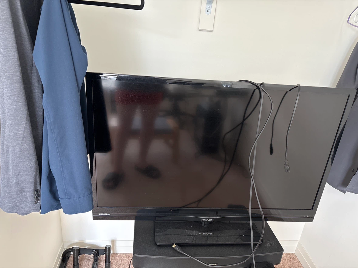 Hitachi Flat Screen TV + Bose TV speaker