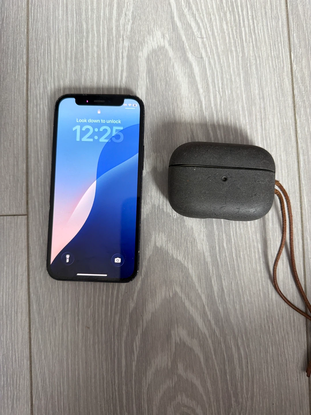 Apple iPhone 12 with AirPods Pro