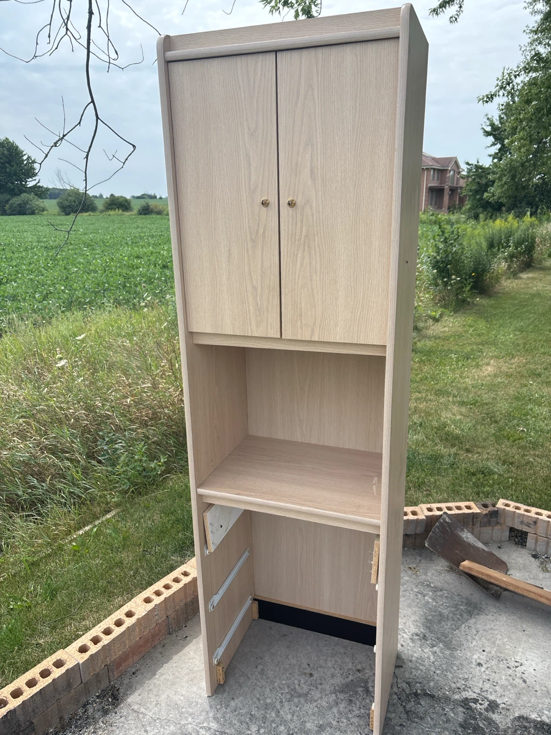 Light Wood Cabinet with Doors and Shelves - photo 2
