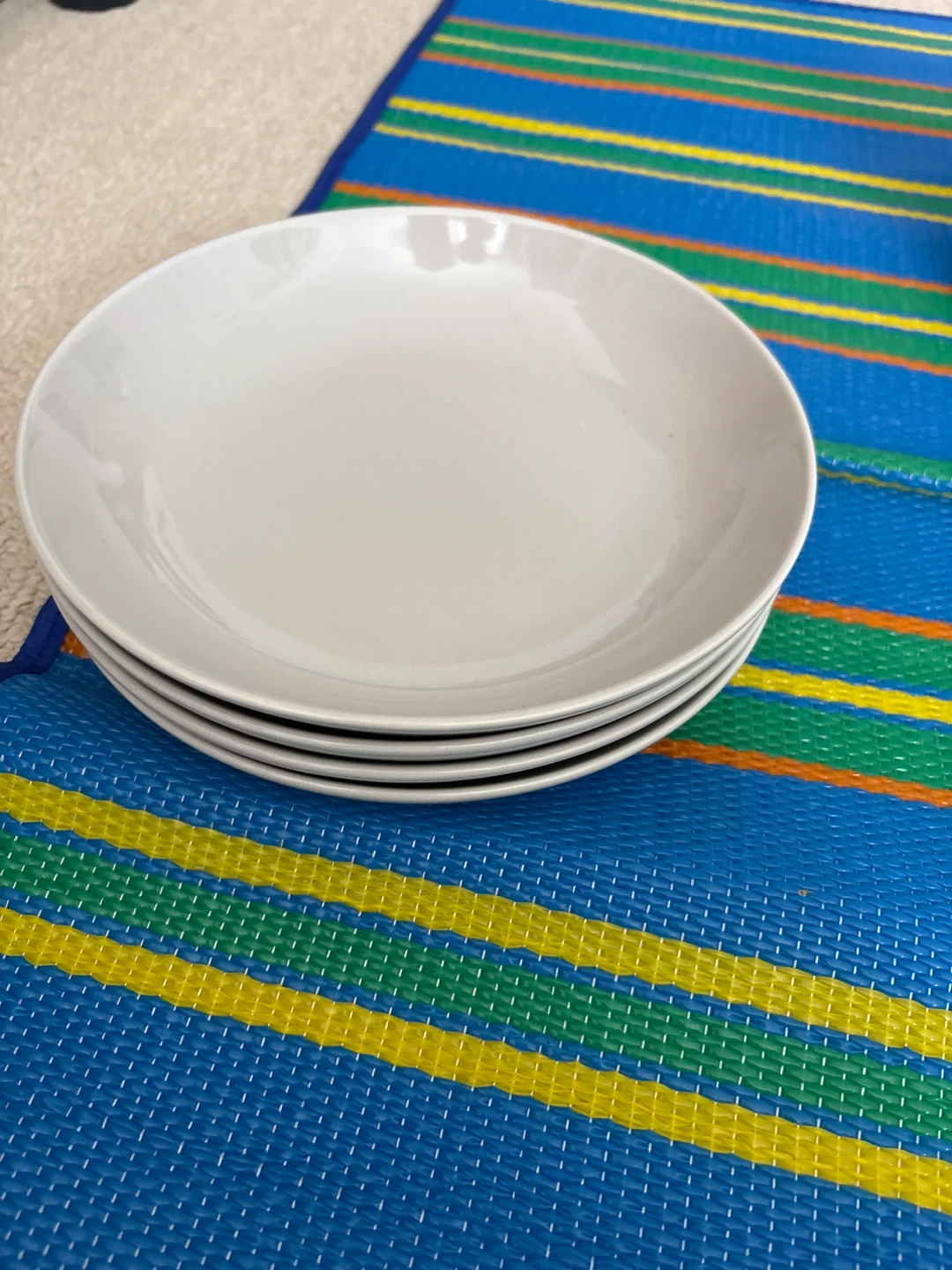 Stack of 4 White Plates
