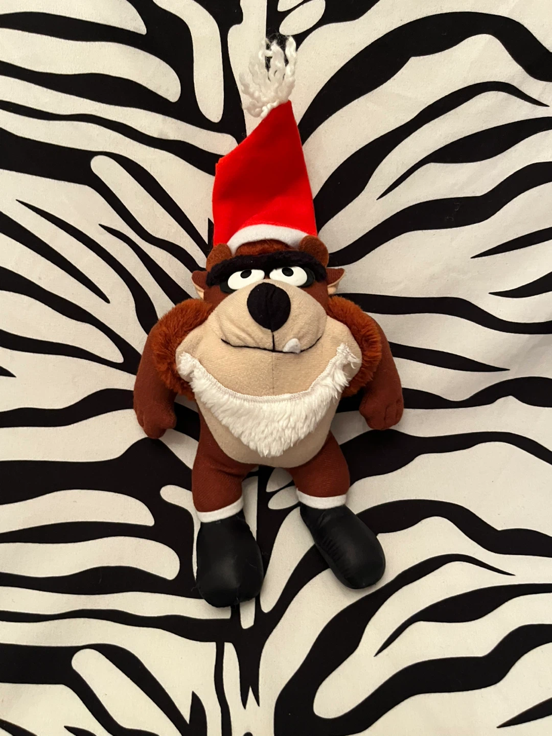 is a 1992 McDonald's Looney Tunes Christmas Taz plush toy