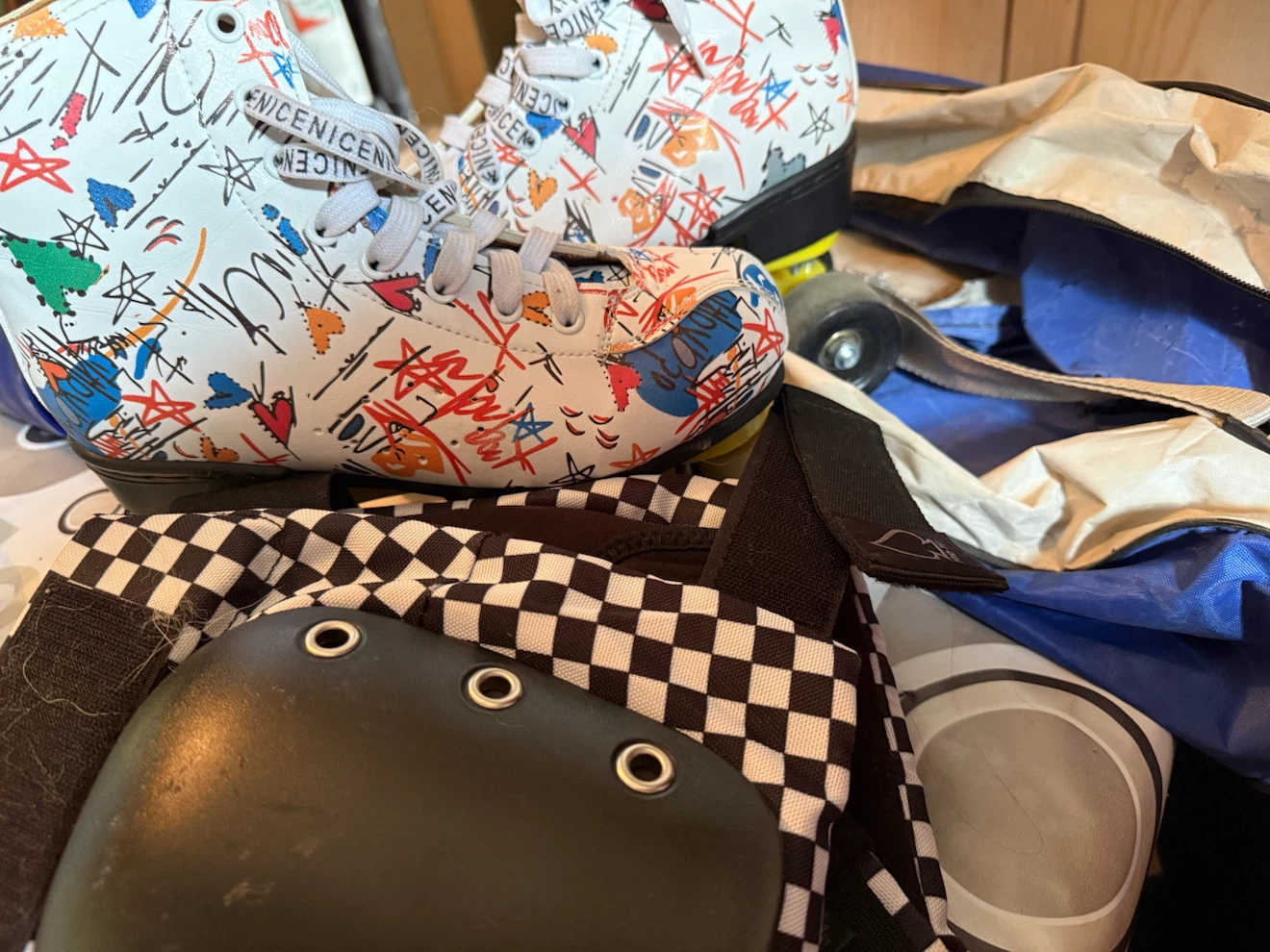White Graffiti Print Roller Skates with Protective Gear